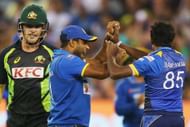 MELBOURNE, AUSTRALIA - FEBRUARY 17:  Seekkuge Prasanna of Sri Lanka (C) and Lakshan Sandakan the dismissal of Michael Klinger of Australia (not pictured) looks on as Aaron Finch of Australia during the first International Twenty20 match between Australia and Sri Lanka at Melbourne Cricket Ground on February 17, 2017 in Melbourne, Australia.  (Photo by Michael Dodge/Getty Images)